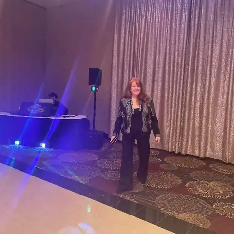DJ Betty hosting an elegant event